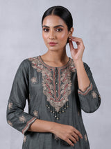 Dark green embroidered slub silk straight salwar suit