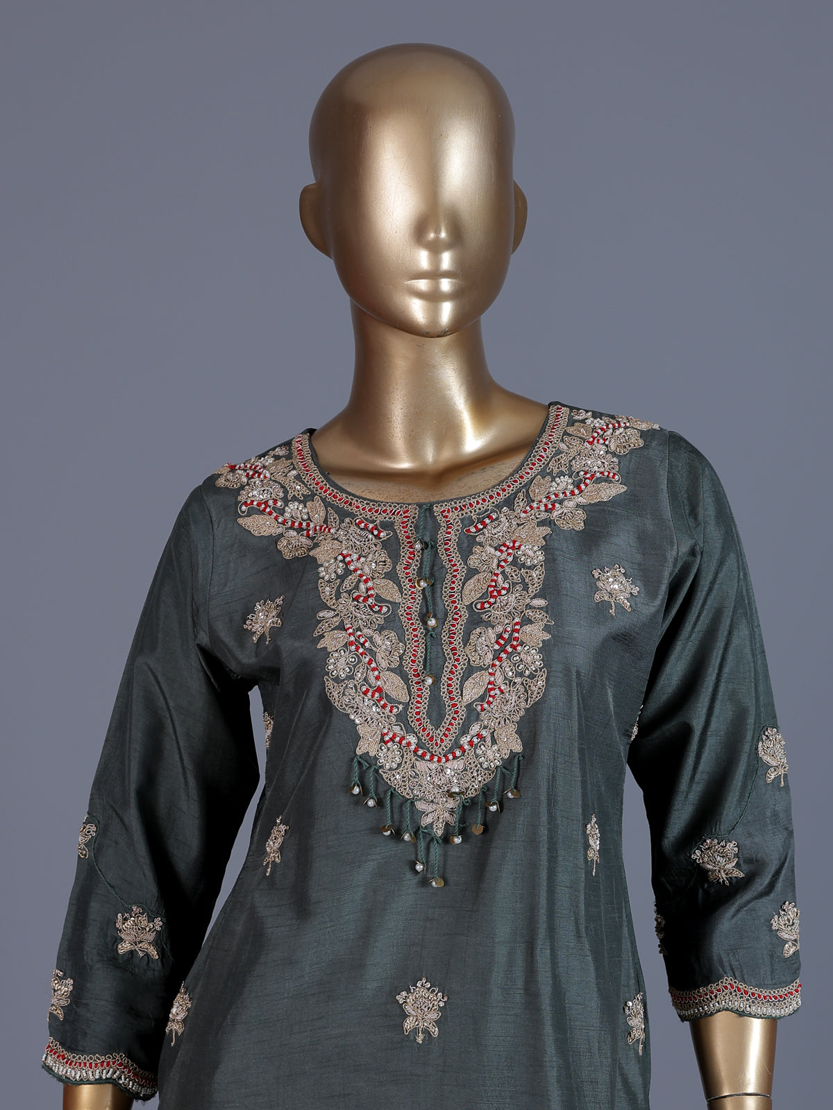 Dark green embroidered slub silk straight salwar suit