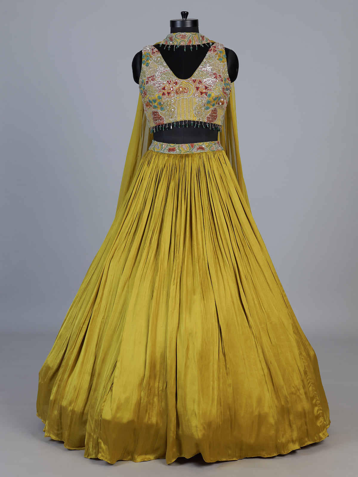 Yellow chinon silk haldi lehenga choli with choker