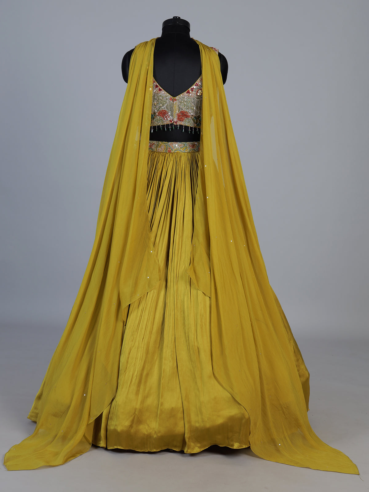 Yellow chinon silk haldi lehenga choli with choker