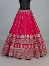 Rani pink bridal raw silk lehenga choli with embellished dupatta