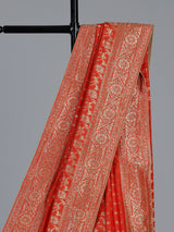 Rust orange premium dola silk saree with elegant zari artistry