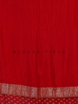 Red festive dola silk saree with heritage zari craftsmanship