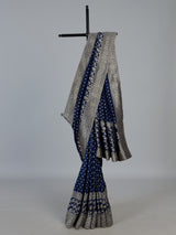 Blue designer dola silk saree with luxurious floral zari weaving