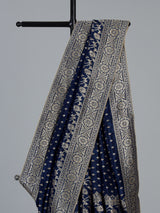 Blue designer dola silk saree with luxurious floral zari weaving
