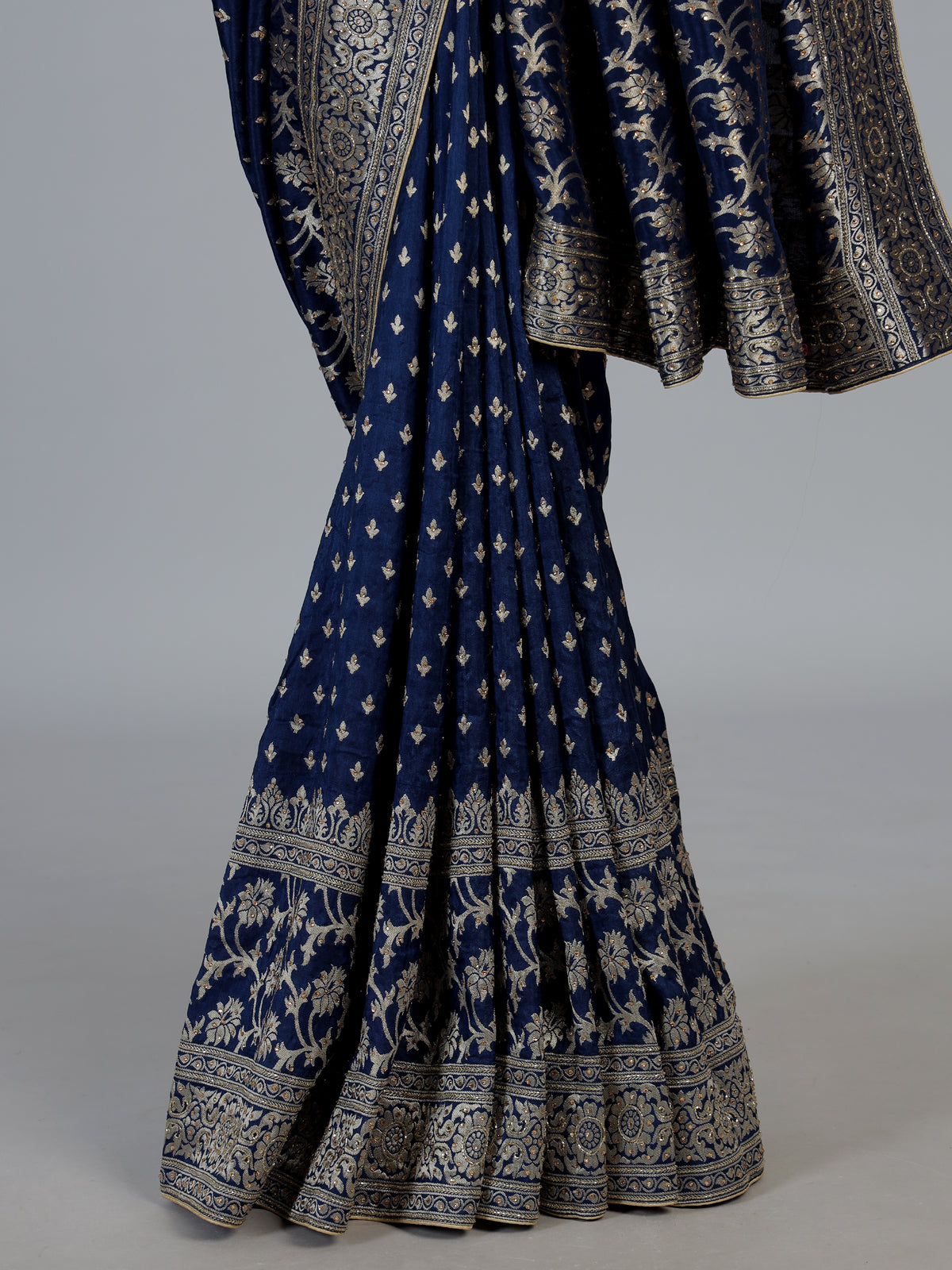 Blue designer dola silk saree with luxurious floral zari weaving