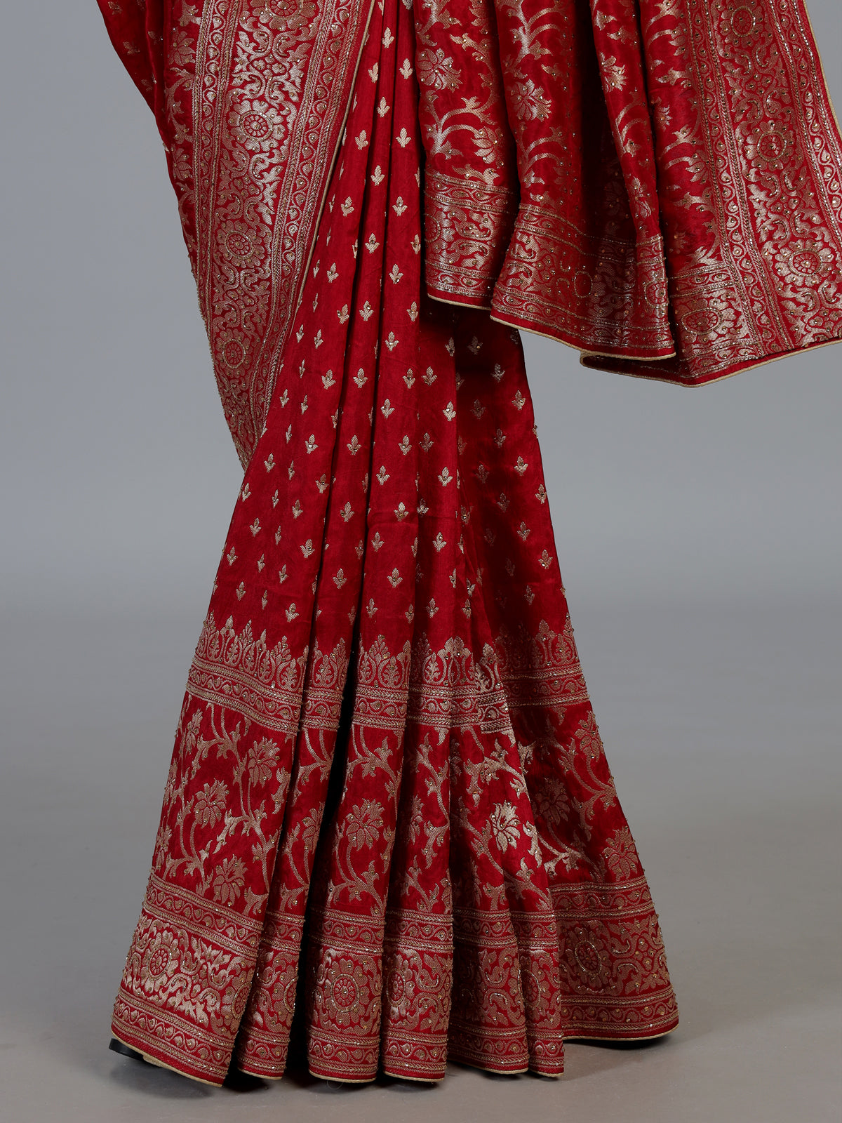 Maroon royal dola silk saree with ornate zari woven border