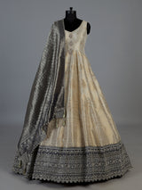 Ivory silk sleeveless anarkali salwar suit with elegant dupatta