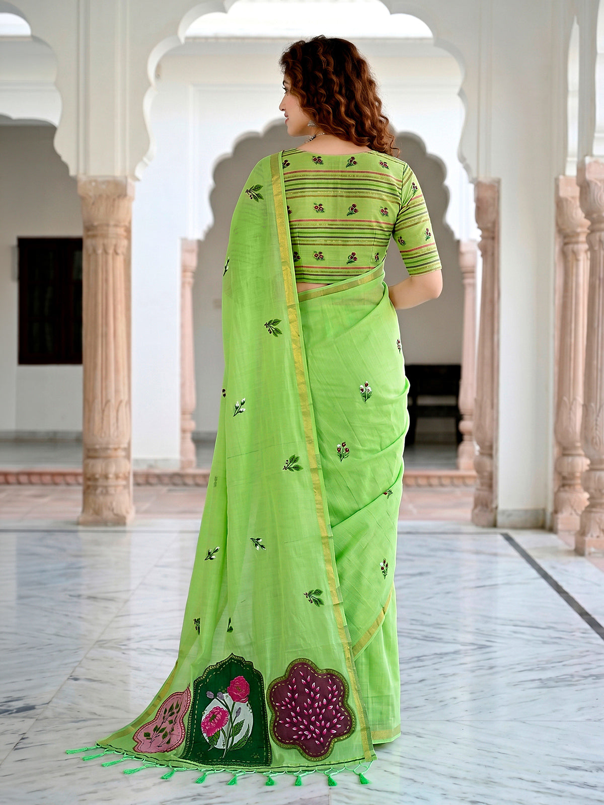 Green floral printed cotton blend saree with elegant patch work
