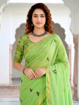 Green floral printed cotton blend saree with elegant patch work