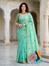 Mint blue printed cotton saree with handcrafted patch design