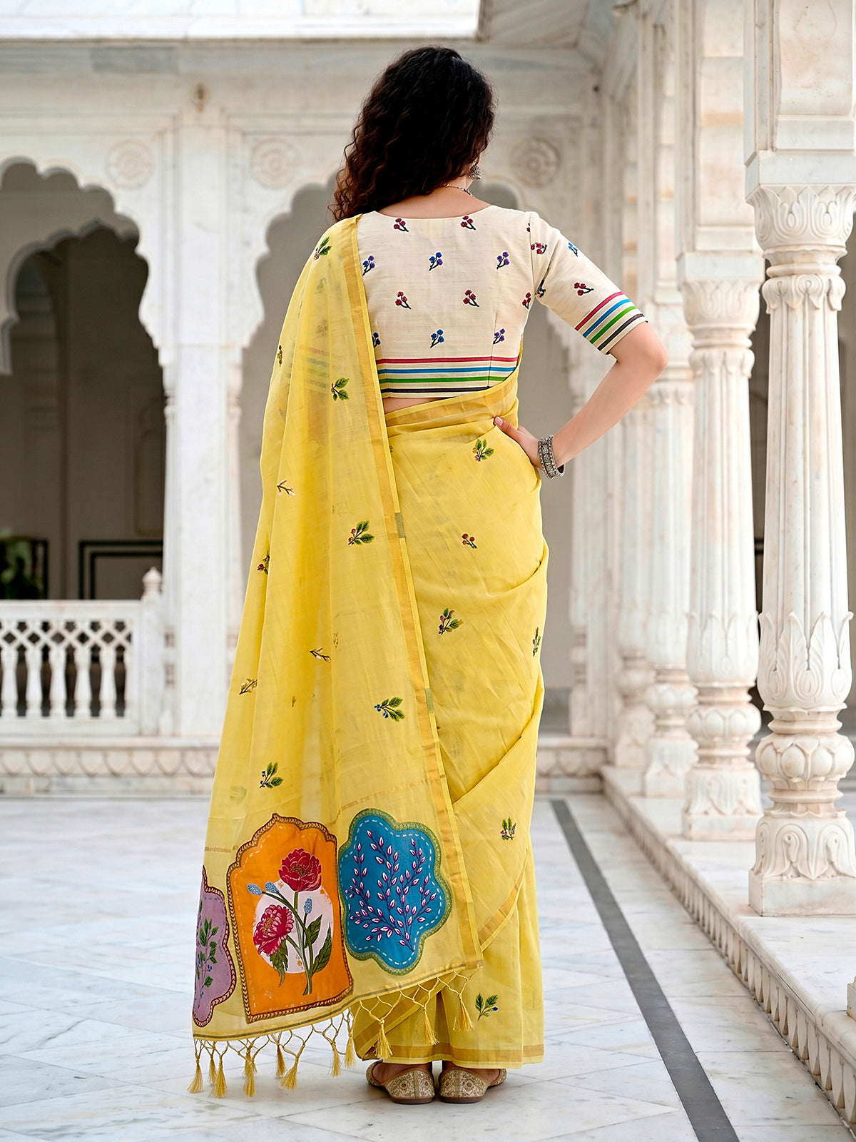 Light yellow elegant cotton blend saree with floral patch work