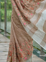 Brown floral kashmiri embroidered linen saree with elegant tassels