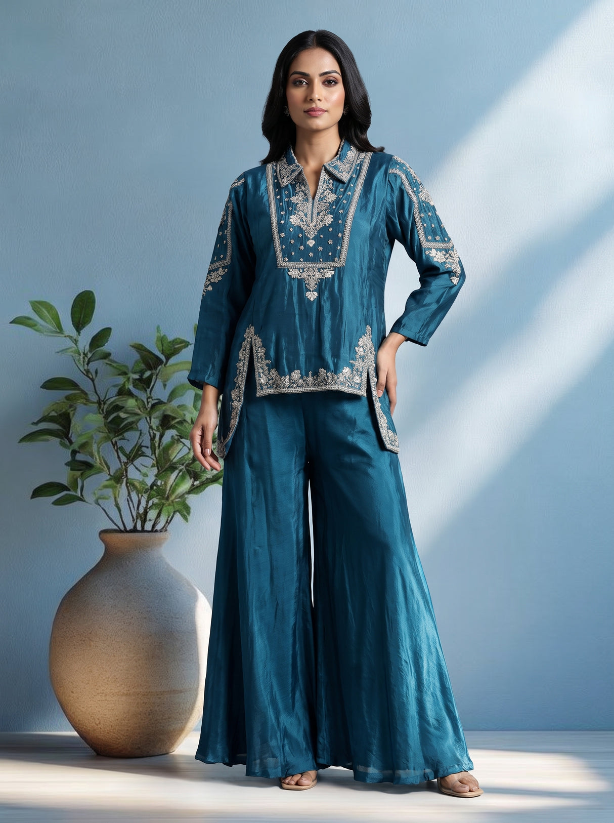 Blue designer silk sharara suit with contemporary asymmetrical style