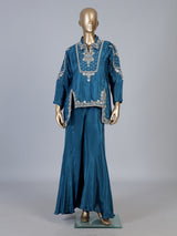 Blue designer silk sharara suit with contemporary asymmetrical style