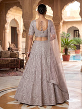 Onion pink embellished net designer lehenga choli