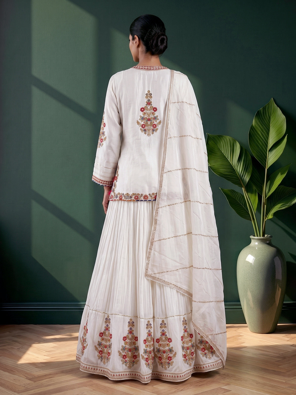 White embroidered crepe silk lehenga choli with dupatta