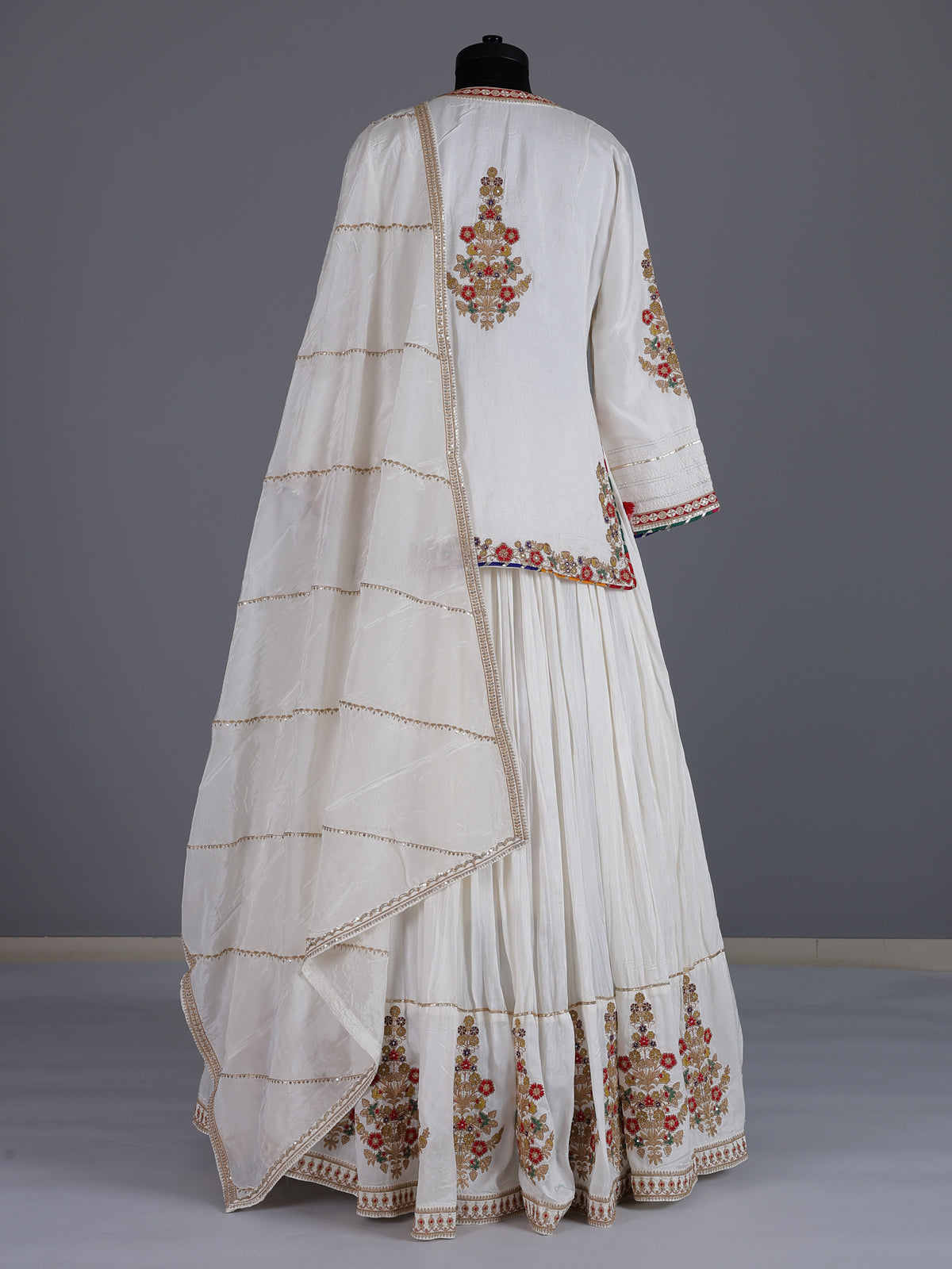 White embroidered crepe silk lehenga choli with dupatta