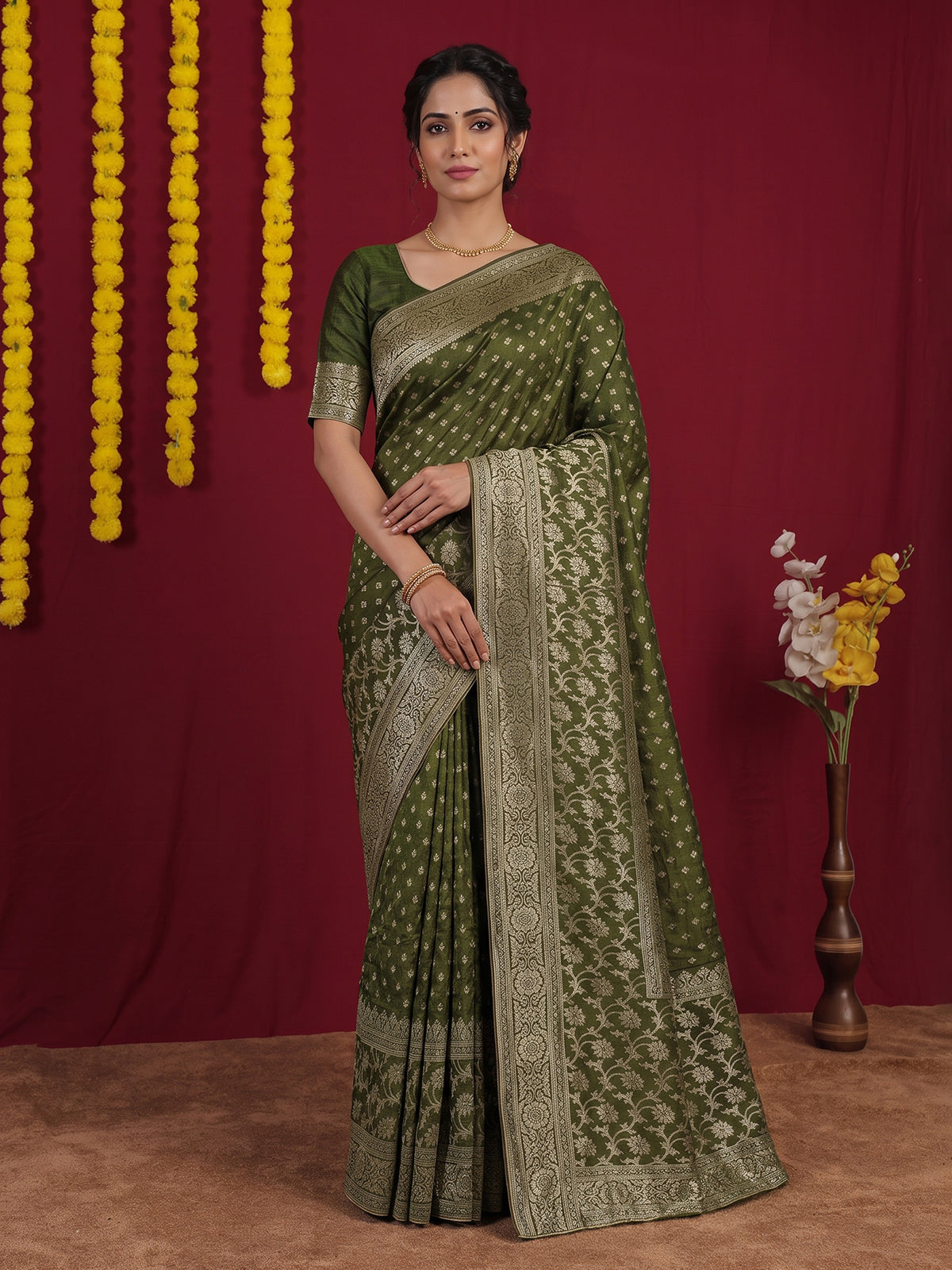 Green zari woven dola silk festive saree design