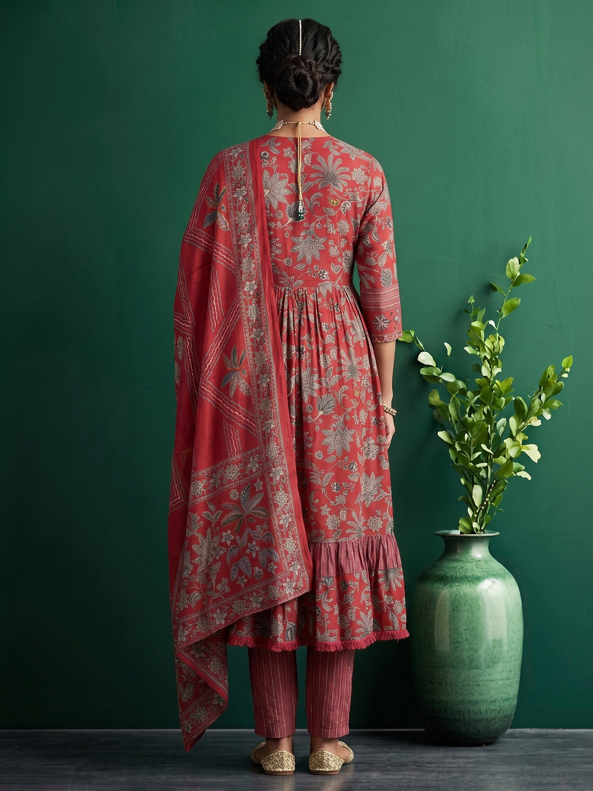 Red printed kurti set with kalamkari inspired charm