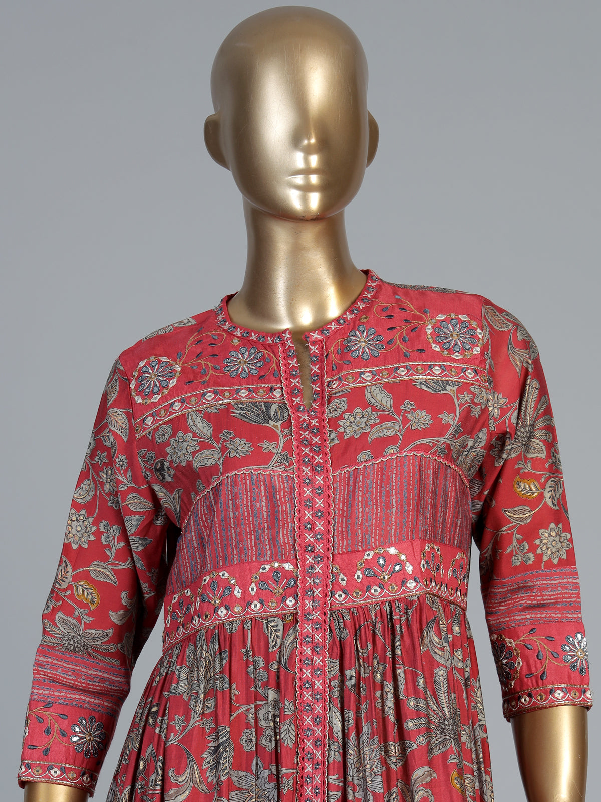Red printed kurti set with kalamkari inspired charm