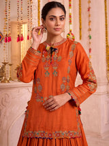 Rust orange raw silk lehenga choli with festive dupatta style