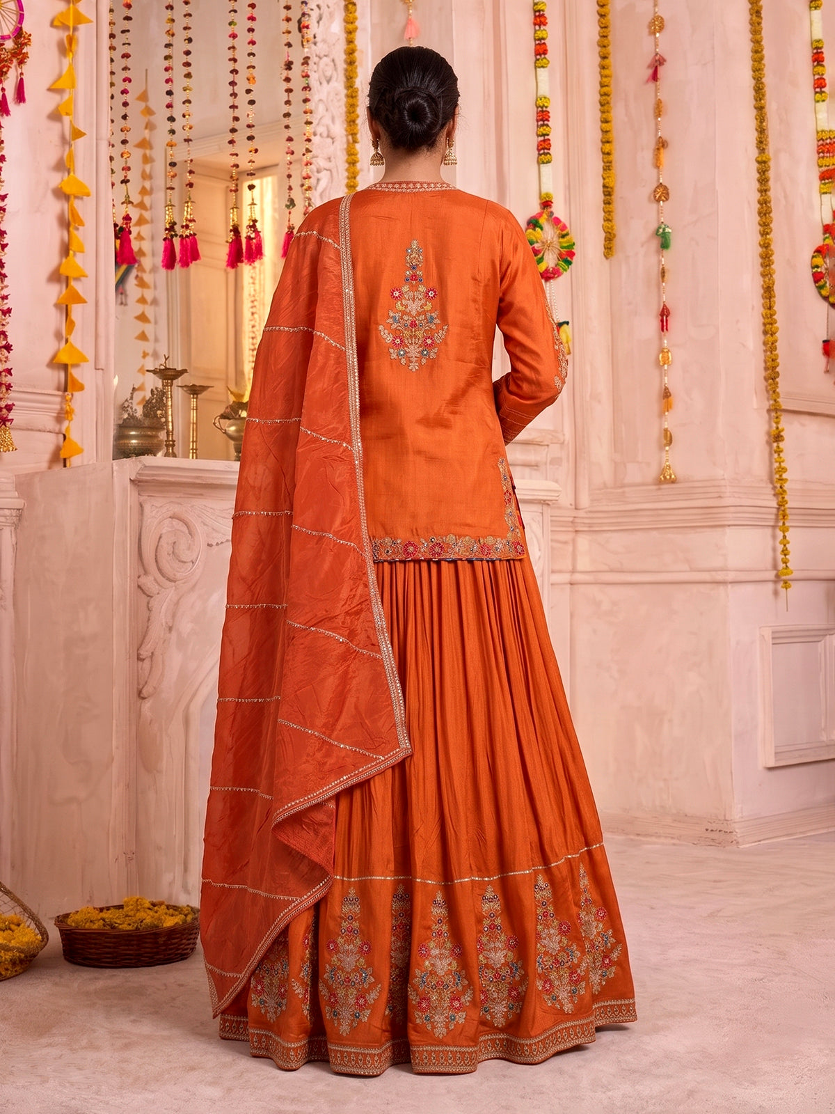 Rust orange raw silk lehenga choli with festive dupatta style