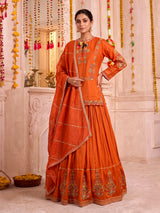 Rust orange raw silk lehenga choli with festive dupatta style