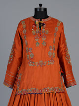 Rust orange raw silk lehenga choli with festive dupatta style