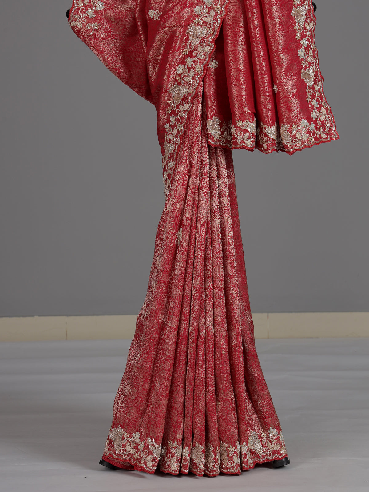 Red tissue silk designer saree with luxurious festive