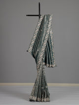 Rama green tissue silk saree with elegant festive craftsmanship