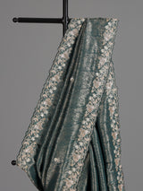 Rama green tissue silk saree with elegant festive craftsmanship