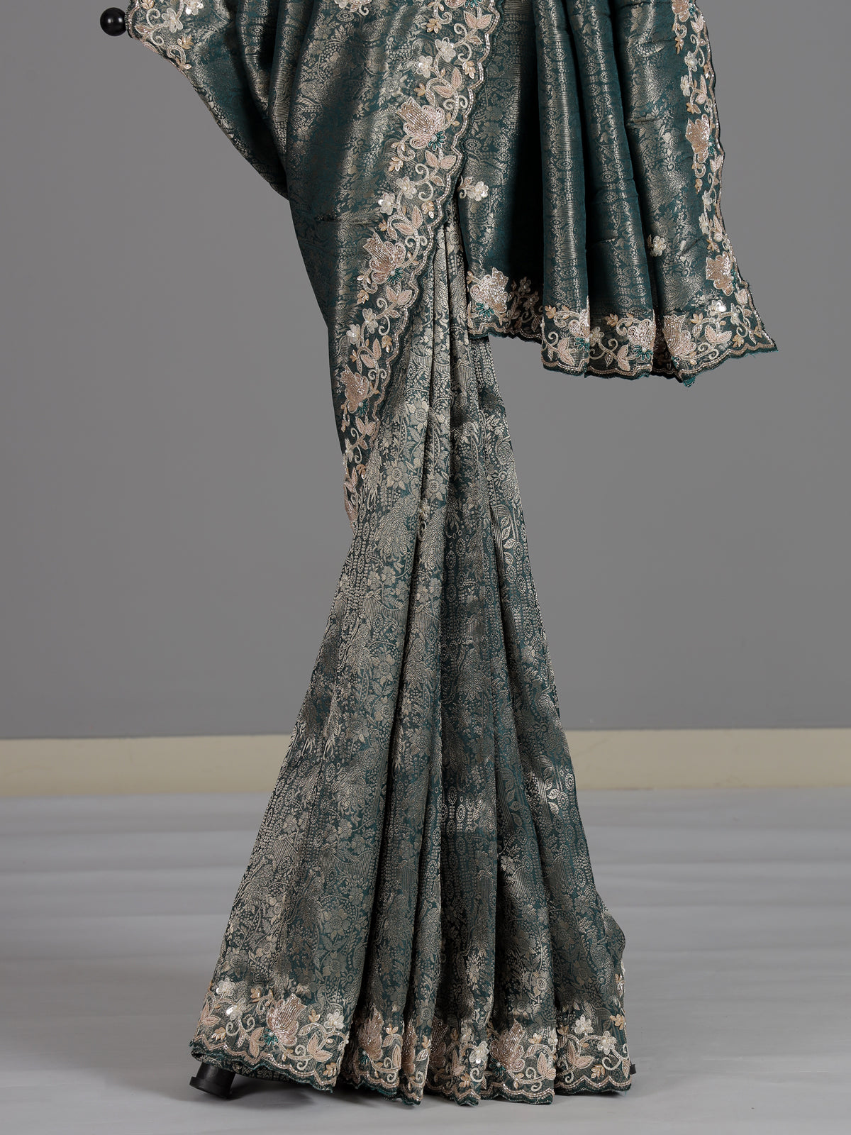 Rama green tissue silk saree with elegant festive craftsmanship
