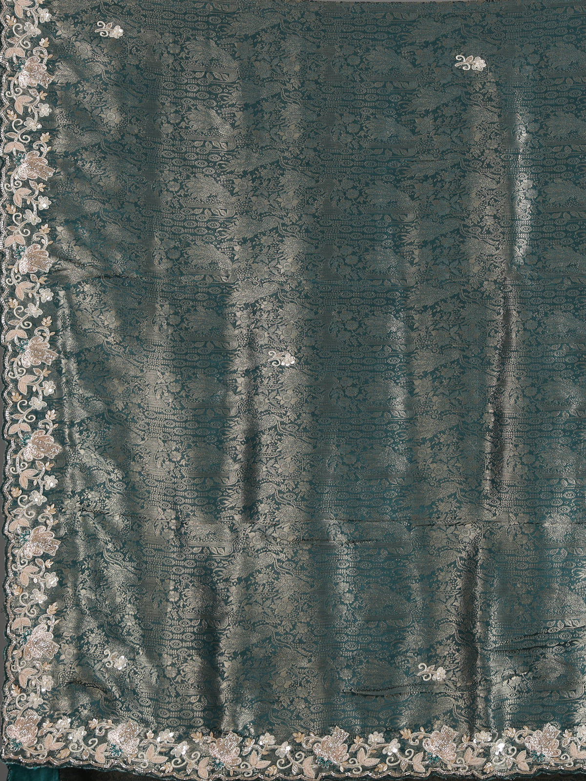 Rama green tissue silk saree with elegant festive craftsmanship