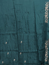 Rama green tissue silk saree with elegant festive craftsmanship