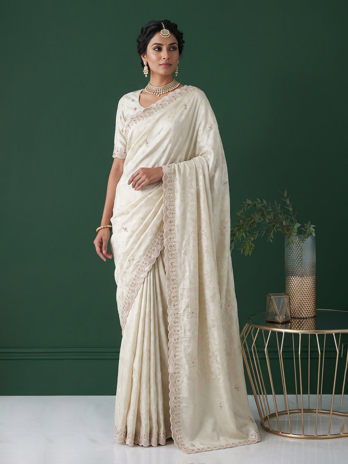 Off white ziraf silk festive saree with premium handcrafted details