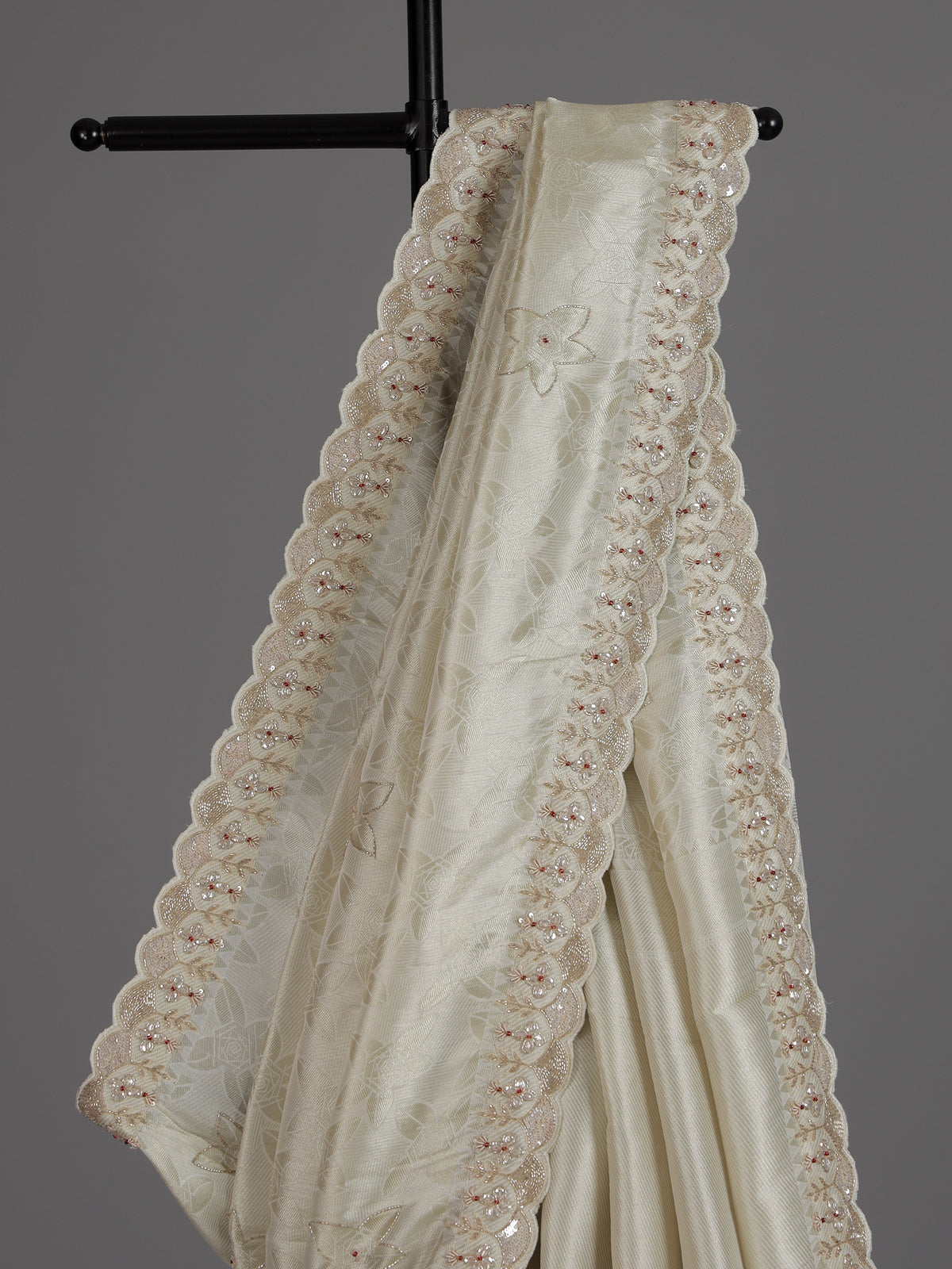 Off white ziraf silk festive saree with premium handcrafted details