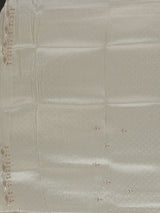 Off white ziraf silk festive saree with premium handcrafted details
