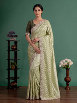 Pista green tissue dola silk saree with graceful festive