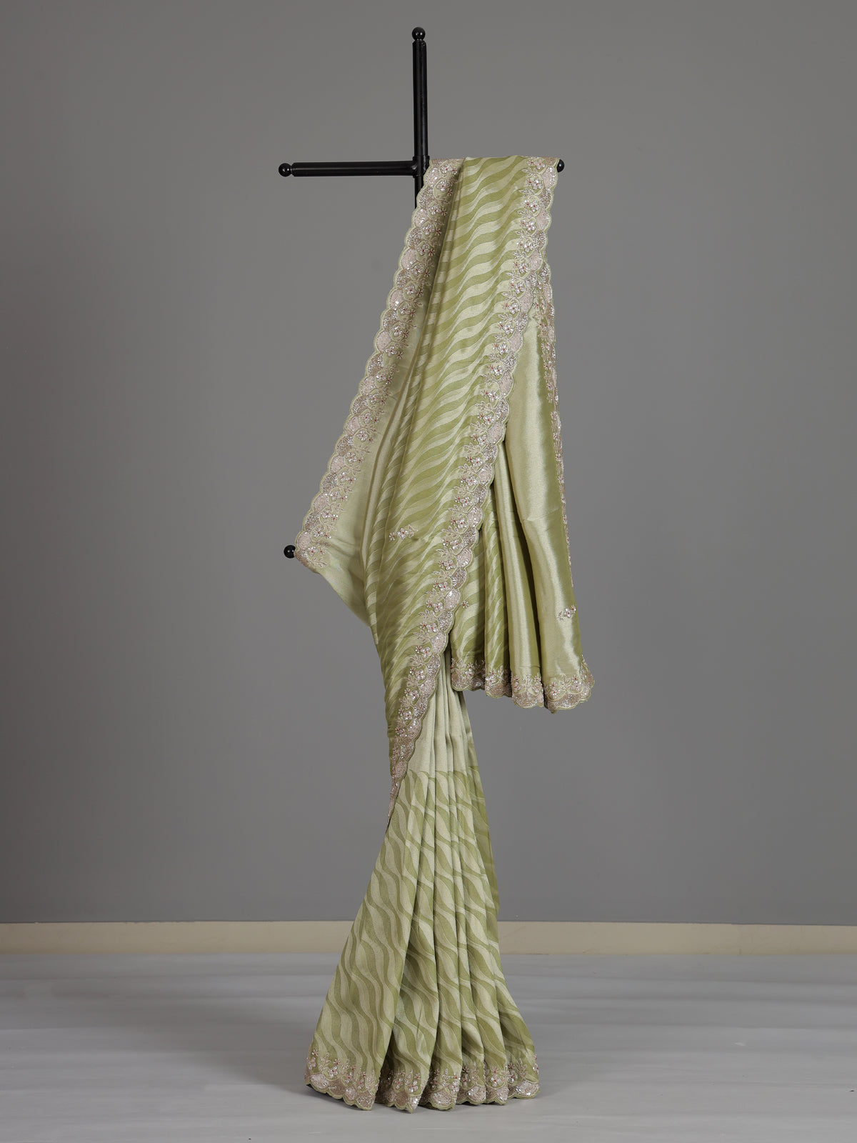Pista green tissue dola silk saree with graceful festive