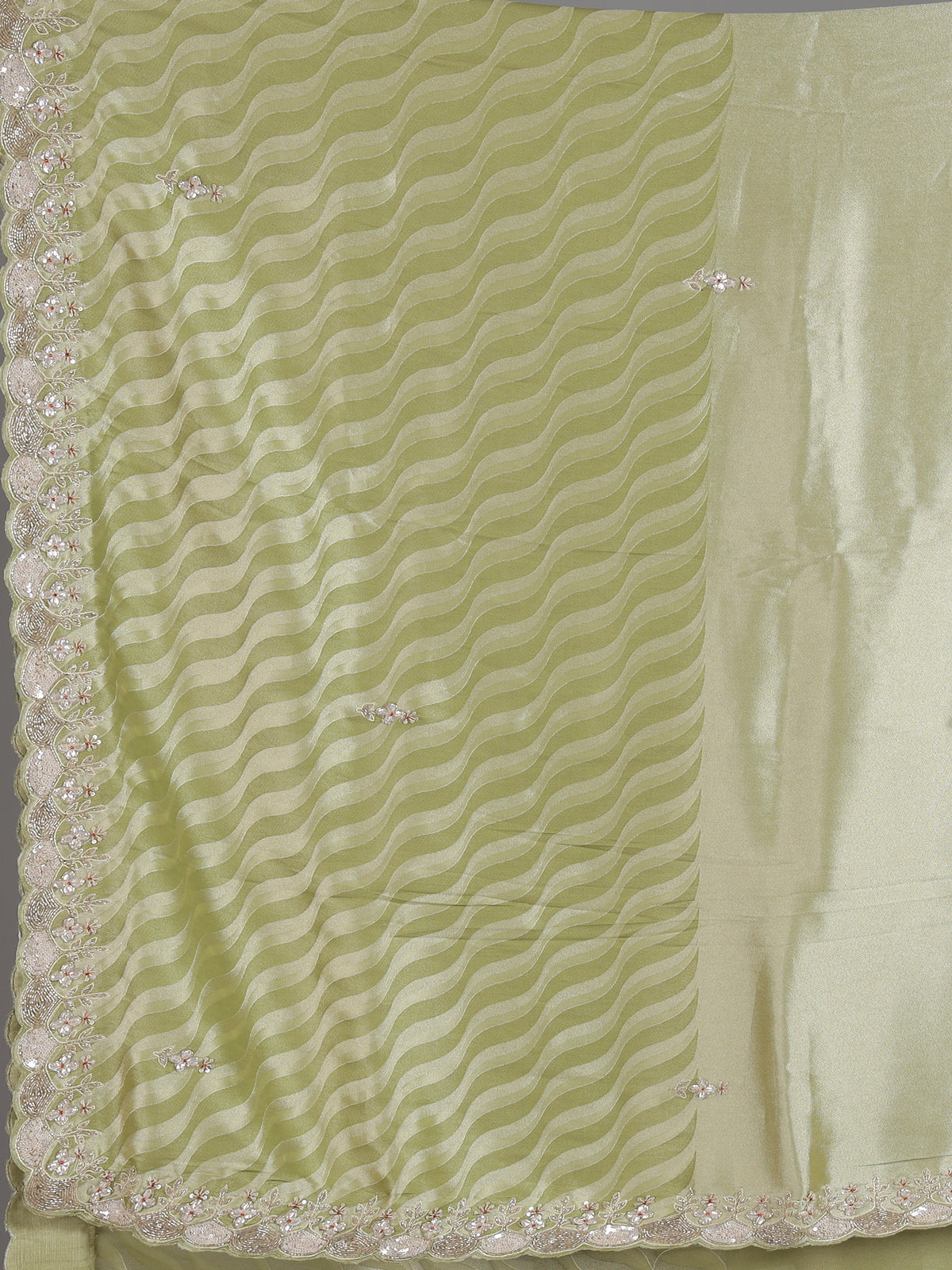 Pista green tissue dola silk saree with graceful festive