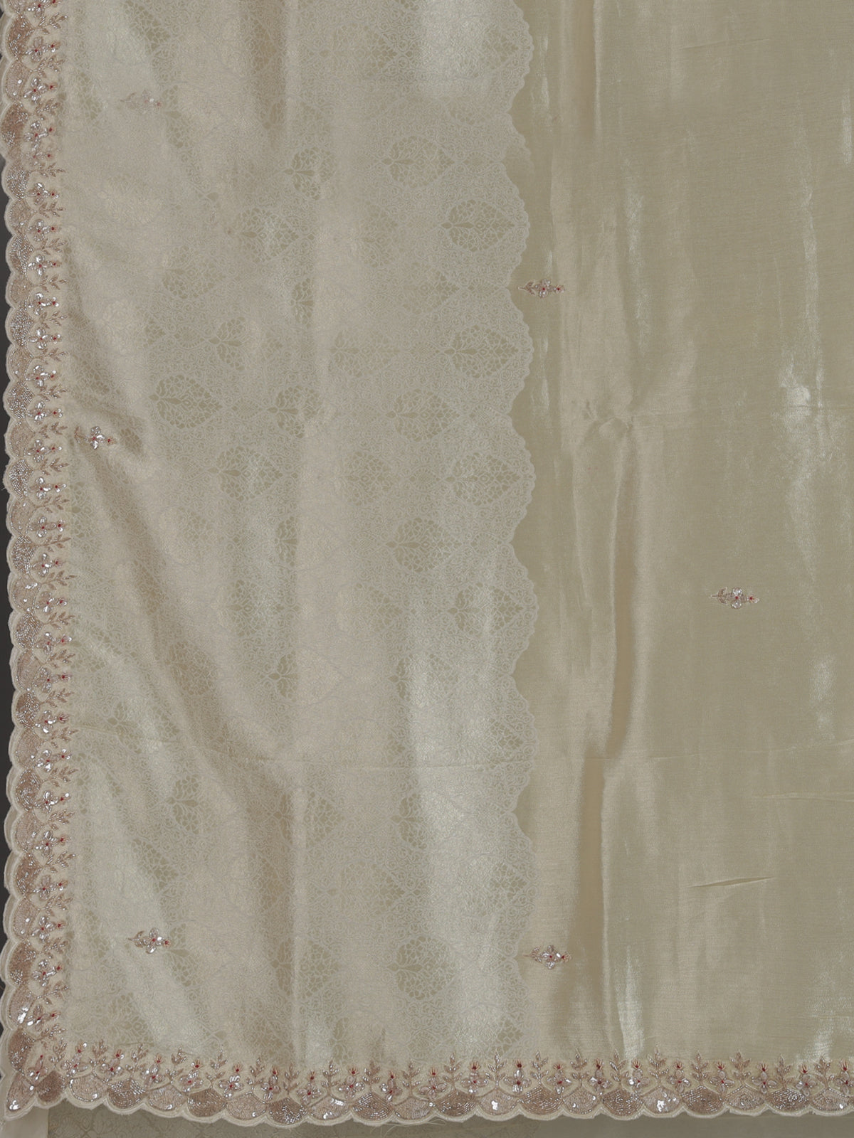 Off white tissue dola silk saree with timeless festive elegance