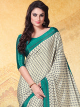 Off white and green crepe silk designer saree with contrast border
