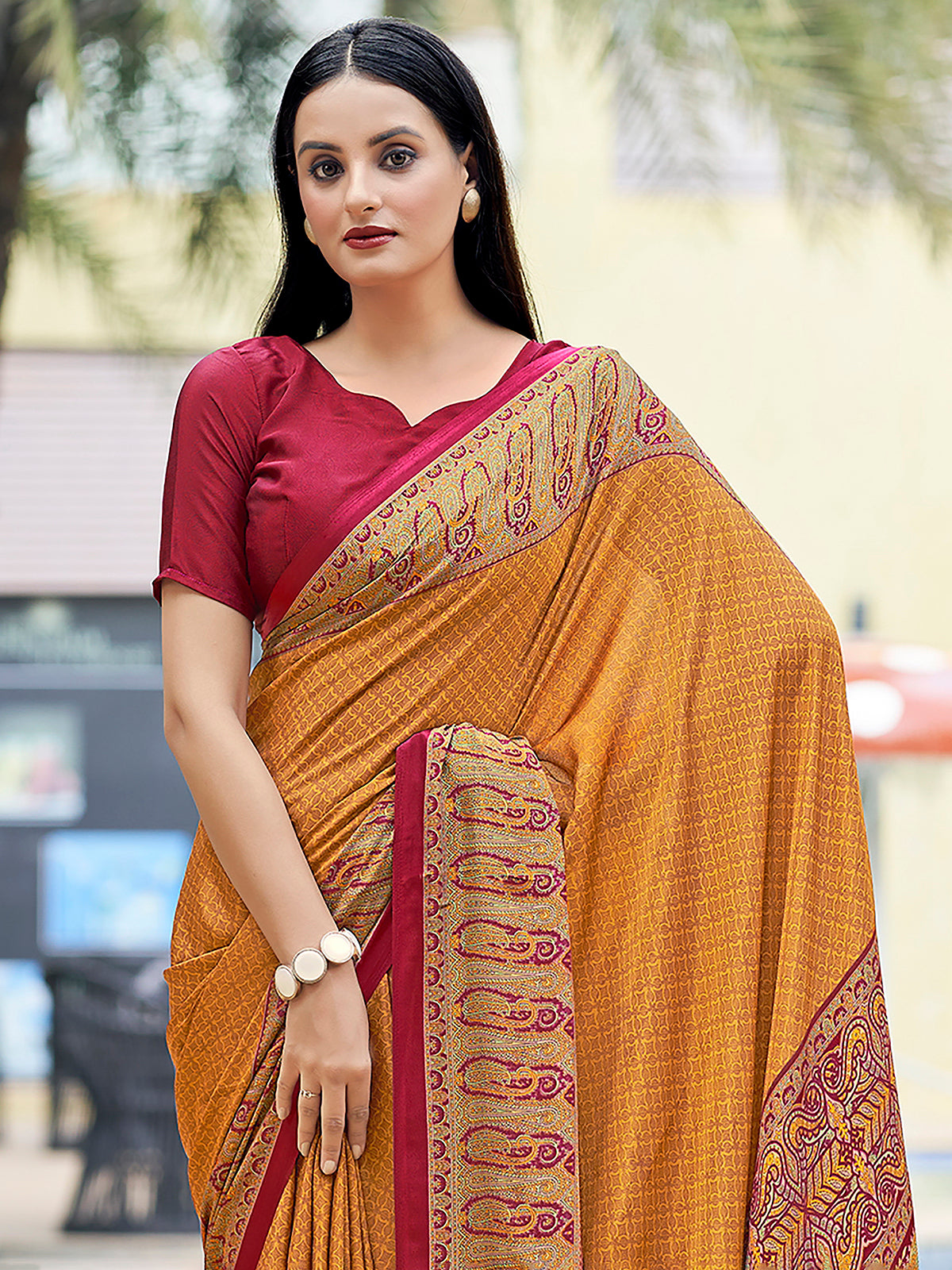 Mustard yellow printed crepe silk casual saree with contrast border and pallu
