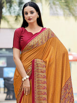 Mustard yellow printed crepe silk casual saree with contrast border and pallu