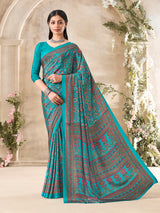 Aqua blue floral printed crepe silk elegant casual wear saree design
