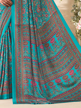 Aqua blue floral printed crepe silk elegant casual wear saree design