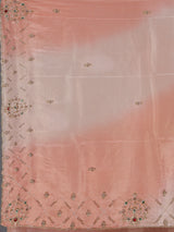 Graceful peach shaded dola shimmer saree for festive occasions