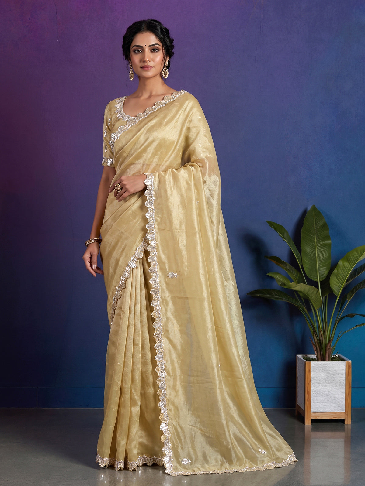Classic cream tissue silk saree for party and reception wear
