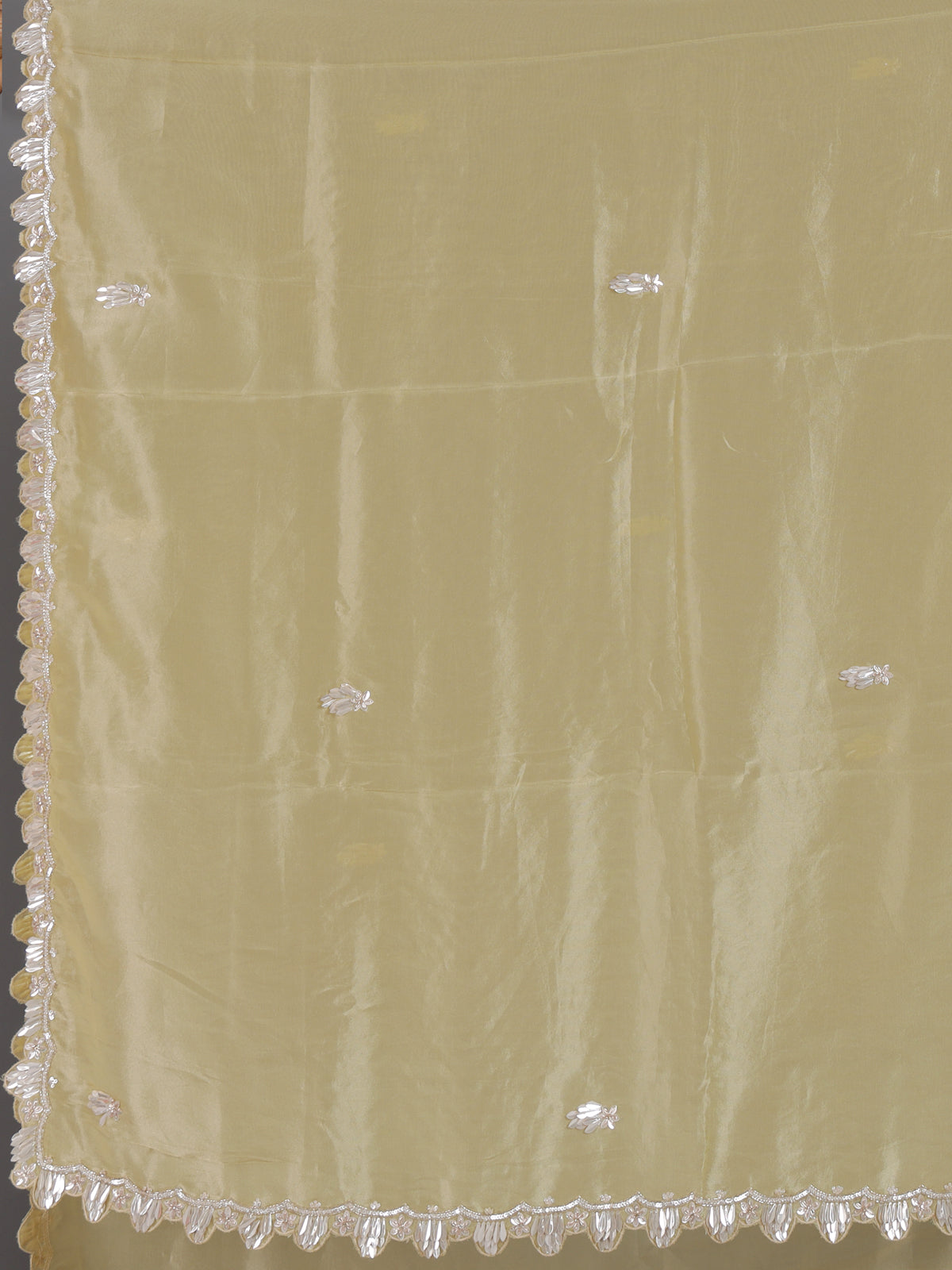 Classic cream tissue silk saree for party and reception wear